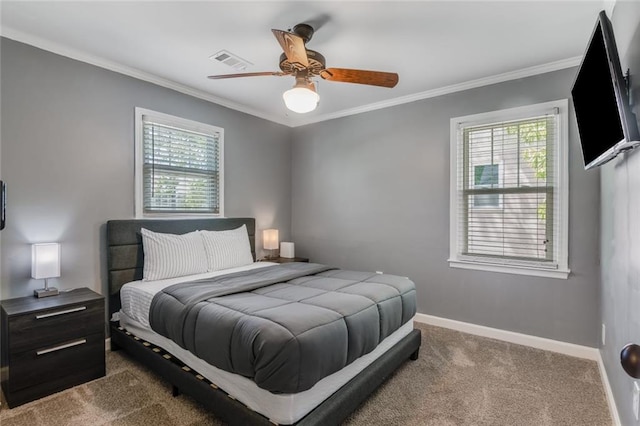 1123 Seaboard Ave NW, Atlanta, GA 30318 - bedroom featuring crown molding, carpet, baseboards, visible vents, and a ceiling fan