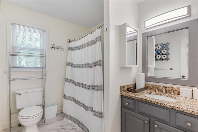 1123 Seaboard Ave NW, Atlanta, GA 30318 - bathroom with a shower with shower curtain, toilet, vanity, marble finish floor, and baseboards