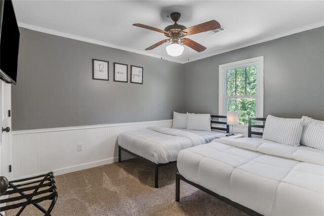 1123 Seaboard Ave NW, Atlanta, GA 30318 - bedroom with visible vents, carpet floors, ornamental molding, and wainscoting