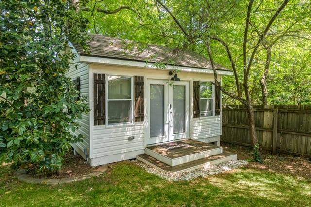 1123 Seaboard Ave NW, Atlanta, GA 30318 - view of outbuilding with french doors and fence