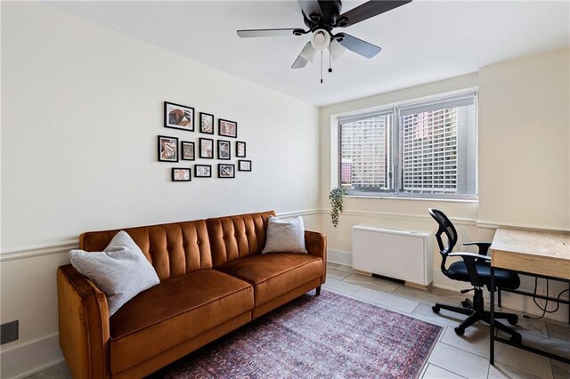 tiled home office with ceiling fan