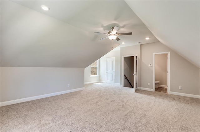 bonus room featuring ceiling fan, lofted ceiling, and carpet floors