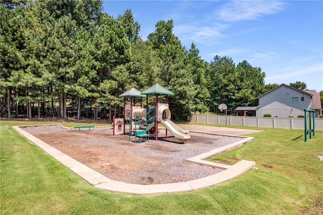 view of playground with a lawn