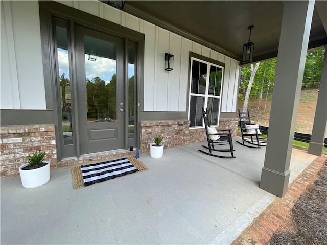 doorway to property featuring a porch