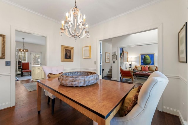 dining area with a notable chandelier, crown molding, and dark wood-type flooring