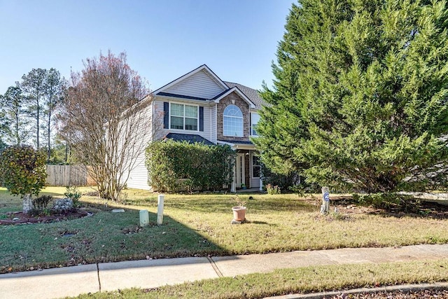 front of property featuring a front yard