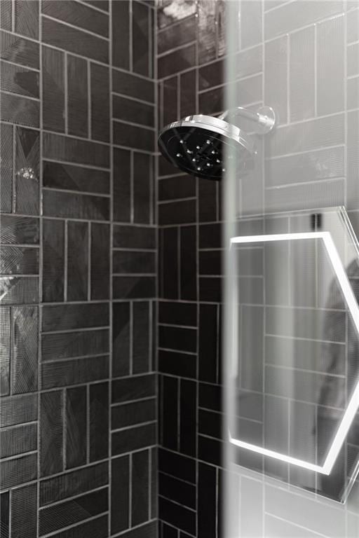 room details with a tile shower