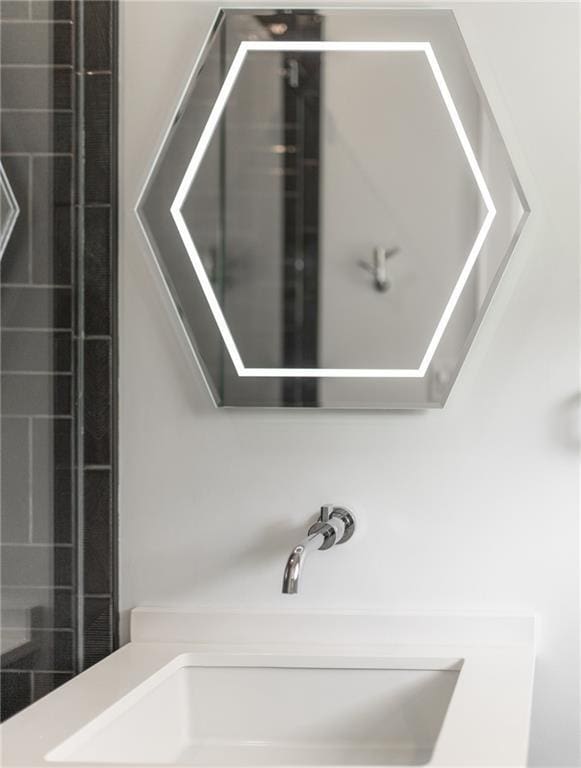 details with tiled shower and sink