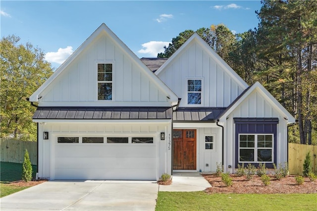 4815 Price Rd, Gainesville, GA 30506 - modern farmhouse with a standing seam roof, board and batten siding, driveway, and a metal roof