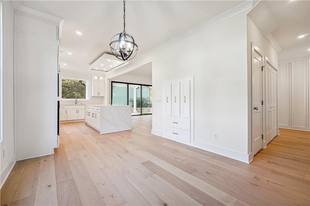 4815 Price Rd, Gainesville, GA 30506 - corridor featuring a chandelier, light wood finished floors, ornamental molding, and recessed lighting