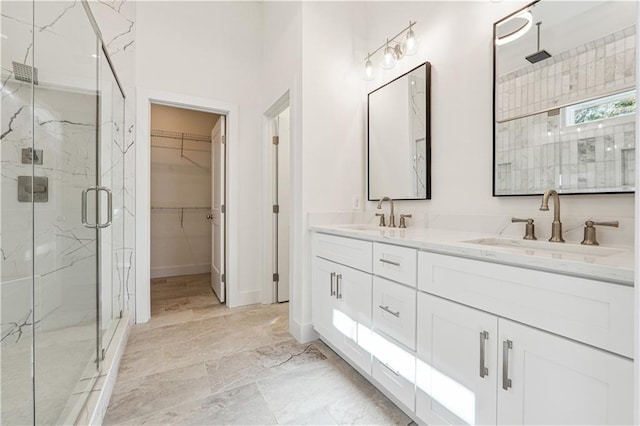 4815 Price Rd, Gainesville, GA 30506 - bathroom with a marble finish shower, double vanity, a spacious closet, and marble finish flooring