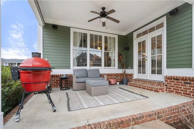 view of patio / terrace featuring french doors and a ceiling fan