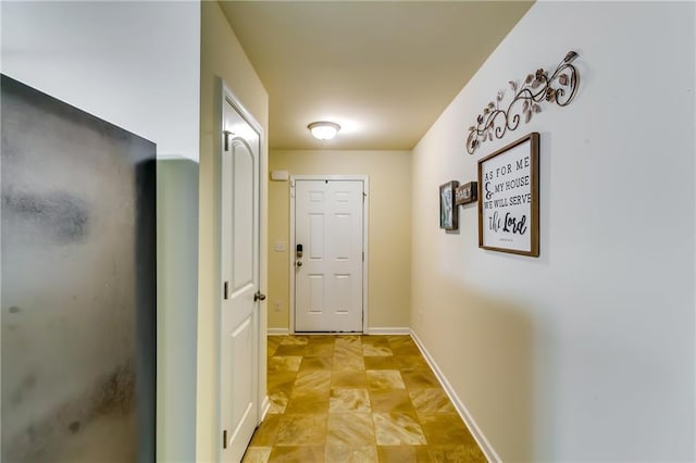 corridor with baseboards