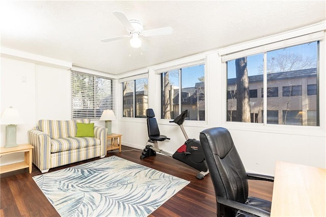 office featuring dark wood-type flooring and ceiling fan