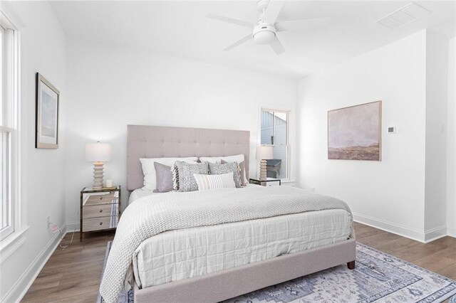3319 Stillwood Ln, Hapeville, GA 30354 - bedroom featuring wood finished floors, baseboards, and ceiling fan