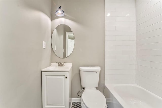 full bath featuring shower / tub combination, vanity, toilet, and baseboards