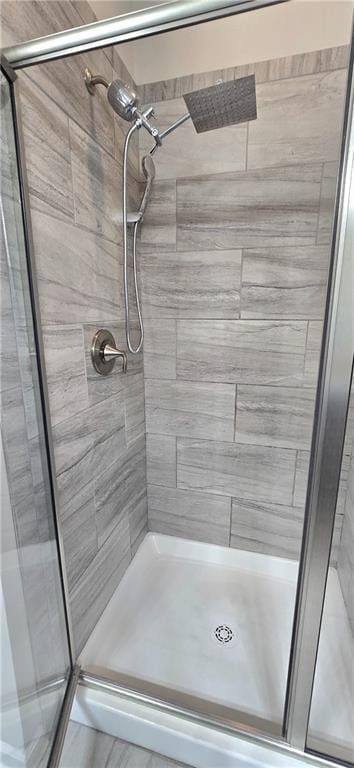 full bath featuring a stall shower