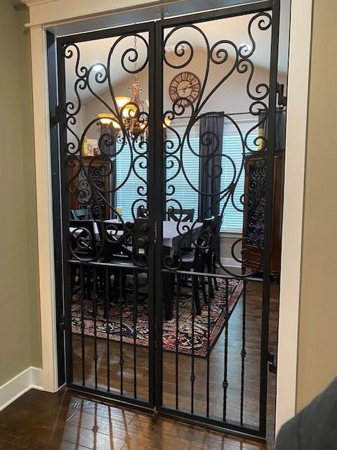 105 Laurel Canyon Trl, Canton, GA 30114 - detailed view of wood finished floors and a gate