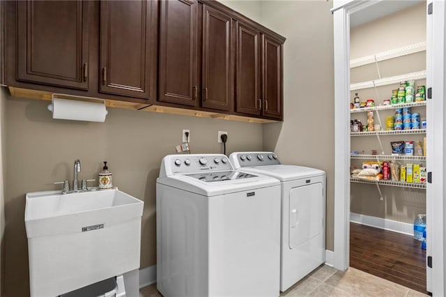 105 Laurel Canyon Trl, Canton, GA 30114 - washroom featuring washer and clothes dryer and cabinet space