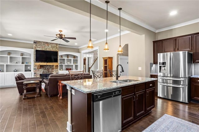 105 Laurel Canyon Trl, Canton, GA 30114 - kitchen with appliances with stainless steel finishes, a ceiling fan, ornamental molding, dark wood-style flooring, and pendant lighting