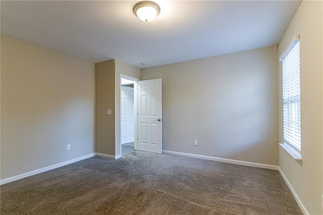 view of carpeted spare room