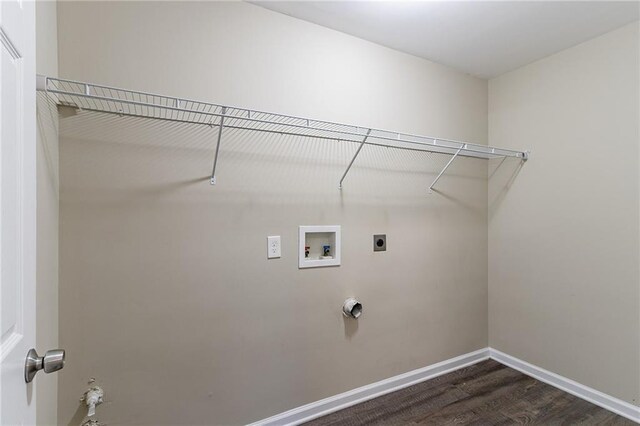 clothes washing area with washer hookup, hookup for an electric dryer, and dark wood-type flooring