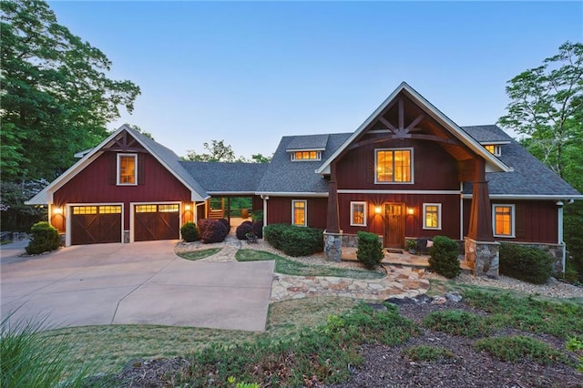 147 Lake Watch Pt, Cleveland, GA 30528 - craftsman inspired home featuring driveway, roof with shingles, a garage, and covered porch