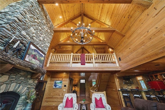 147 Lake Watch Pt, Cleveland, GA 30528 - detailed view of a chandelier, wood ceiling, beam ceiling, and wooden walls