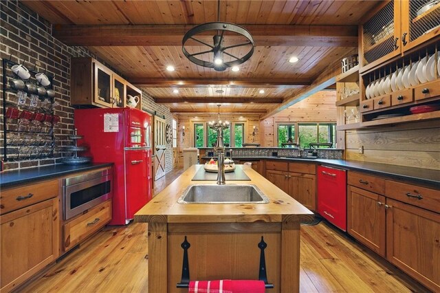 147 Lake Watch Pt, Cleveland, GA 30528 - kitchen with wooden ceiling, light wood finished floors, dishwasher, beamed ceiling, and wooden counters
