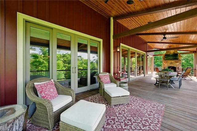 147 Lake Watch Pt, Cleveland, GA 30528 - wooden deck with french doors, an outdoor stone fireplace, and a ceiling fan