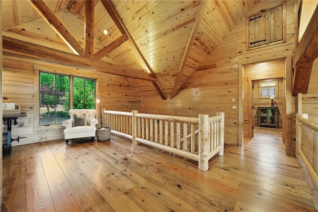 147 Lake Watch Pt, Cleveland, GA 30528 - living area with wooden ceiling, wood-type flooring, wooden walls, and a wood stove