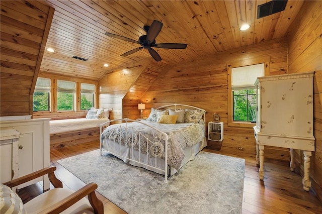 147 Lake Watch Pt, Cleveland, GA 30528 - bedroom with lofted ceiling, wooden walls, wooden ceiling, hardwood / wood-style floors, and recessed lighting