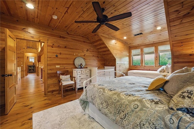 147 Lake Watch Pt, Cleveland, GA 30528 - bedroom with wood ceiling, wood walls, light wood-style flooring, lofted ceiling, and recessed lighting