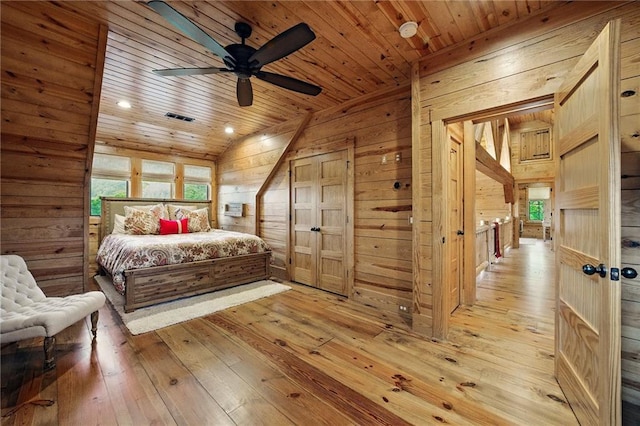 147 Lake Watch Pt, Cleveland, GA 30528 - bedroom featuring wood walls, light wood-type flooring, multiple windows, wood ceiling, and lofted ceiling