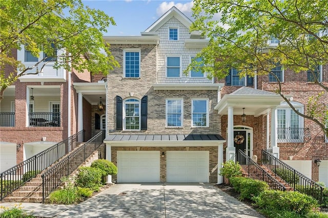 5882 Riverstone Cir Unit 15, Atlanta, GA 30339 - view of property featuring driveway, an attached garage, brick siding, and stairs