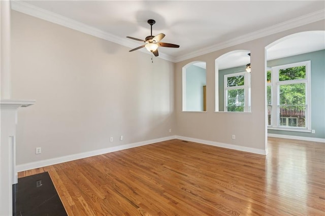 5882 Riverstone Cir Unit 15, Atlanta, GA 30339 - unfurnished living room with a ceiling fan, wood finished floors, crown molding, and baseboards