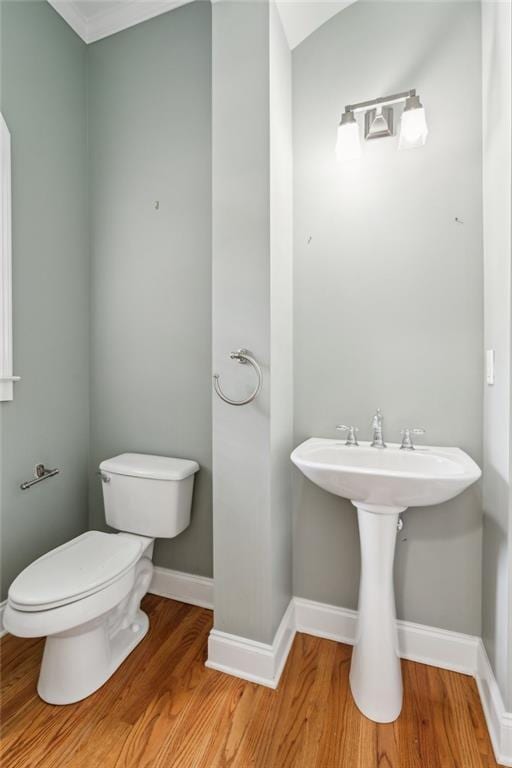5882 Riverstone Cir Unit 15, Atlanta, GA 30339 - bathroom with wood finished floors, toilet, and baseboards