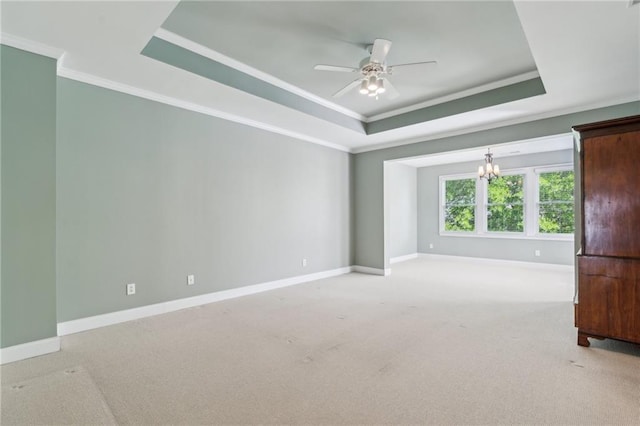 5882 Riverstone Cir Unit 15, Atlanta, GA 30339 - unfurnished room featuring a tray ceiling, crown molding, baseboards, light carpet, and a ceiling fan