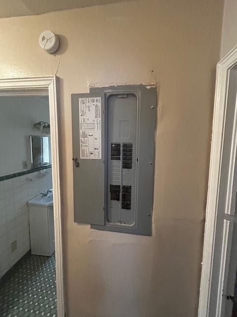 utility room featuring electric panel