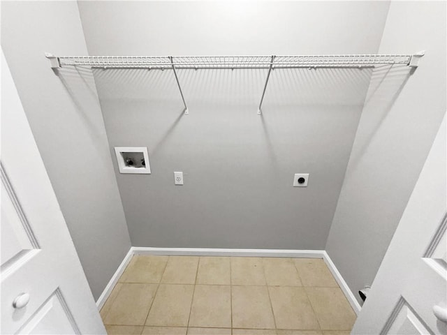 laundry area with washer hookup, hookup for an electric dryer, and tile patterned flooring