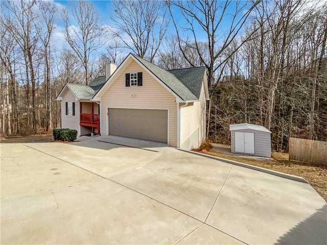 view of front of property featuring a shed