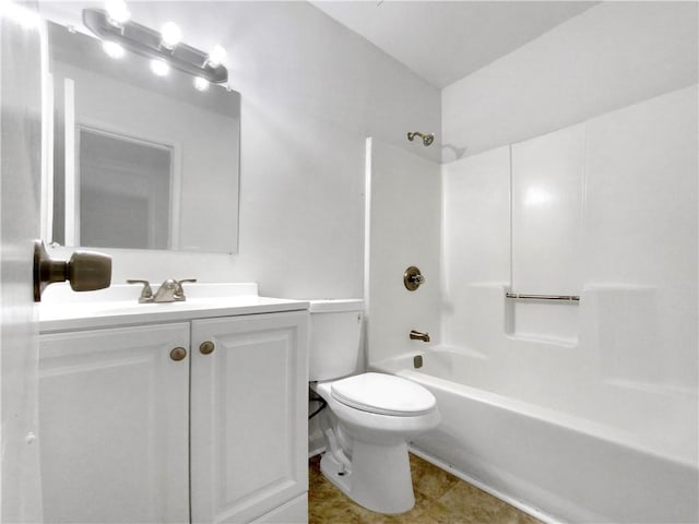 full bathroom featuring tile patterned floors, washtub / shower combination, vanity, and toilet