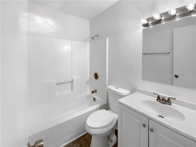 full bathroom featuring shower / bathing tub combination, vanity, and toilet