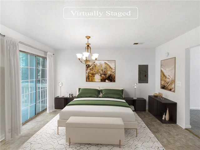 bedroom featuring an inviting chandelier and electric panel