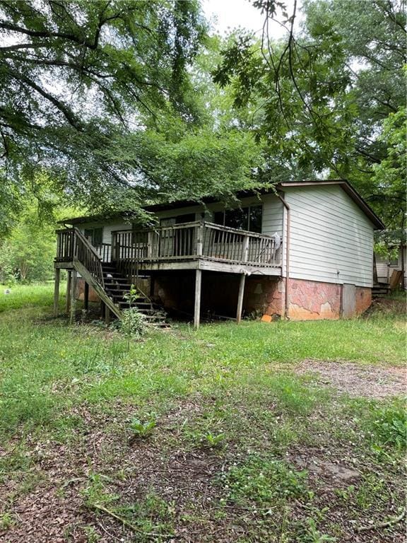 15 Chandler Bridge Rd, Nicholson, GA 30565 - rear view of house with a deck, stairs, and crawl space