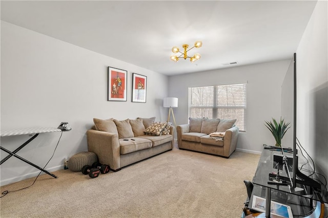 living room featuring a chandelier and light colored carpet