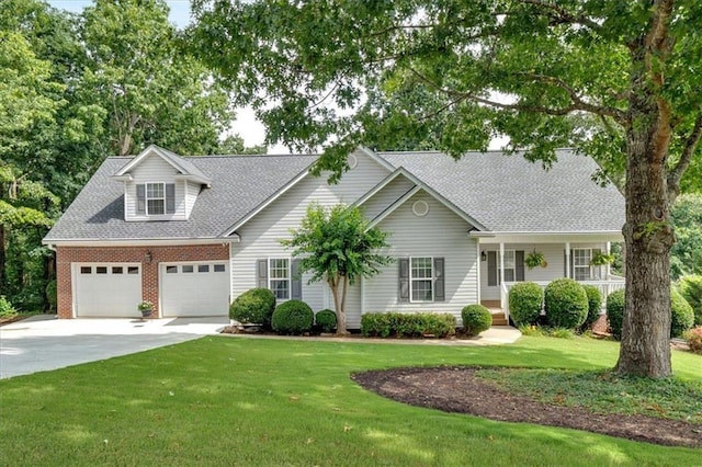17 Sassafras Trl NE, Cartersville, GA 30121 - view of front of home with concrete driveway, a front yard, an attached garage, a shingled roof, and a porch