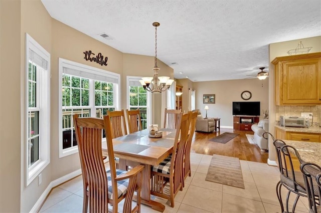 17 Sassafras Trl NE, Cartersville, GA 30121 - dining room with a textured ceiling, light tile patterned floors, and a chandelier