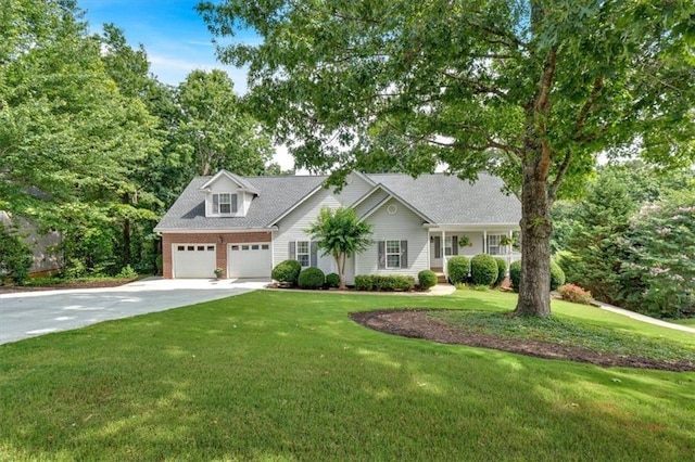 17 Sassafras Trl NE, Cartersville, GA 30121 - view of front facade with concrete driveway, a garage, and a front lawn