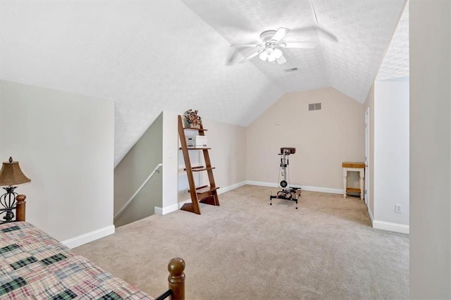 17 Sassafras Trl NE, Cartersville, GA 30121 - carpeted bedroom featuring a textured ceiling, vaulted ceiling, and a ceiling fan